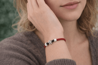 Model wearing a red rope silver bracelet